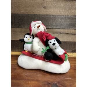 Hallmark Snowman Penguin Dog Plush Animated Singing Sled Ride Holiday Decor